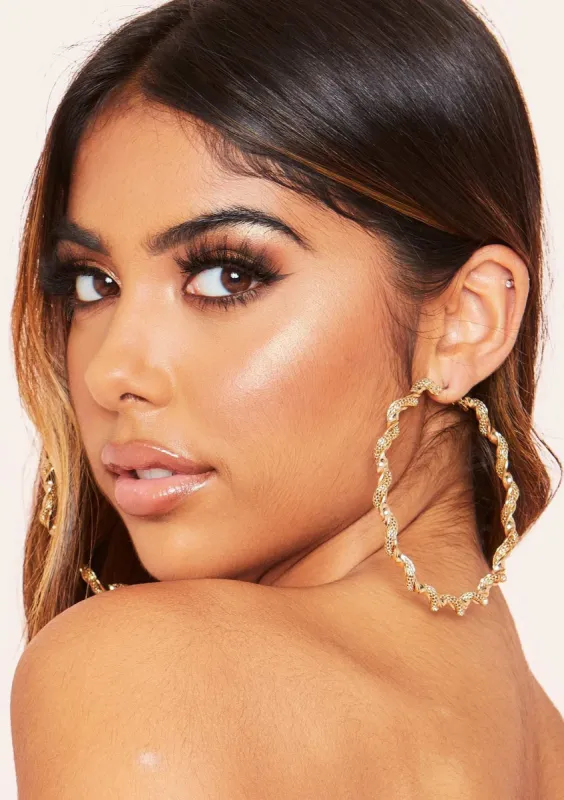 Olivia Gold Twisted Hoop Earrings sold by Missy Empire