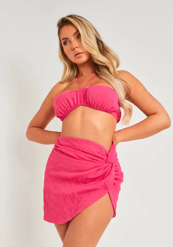 Emily Pink Textured Knot Detail Mini Skirt sold by Missy Empire