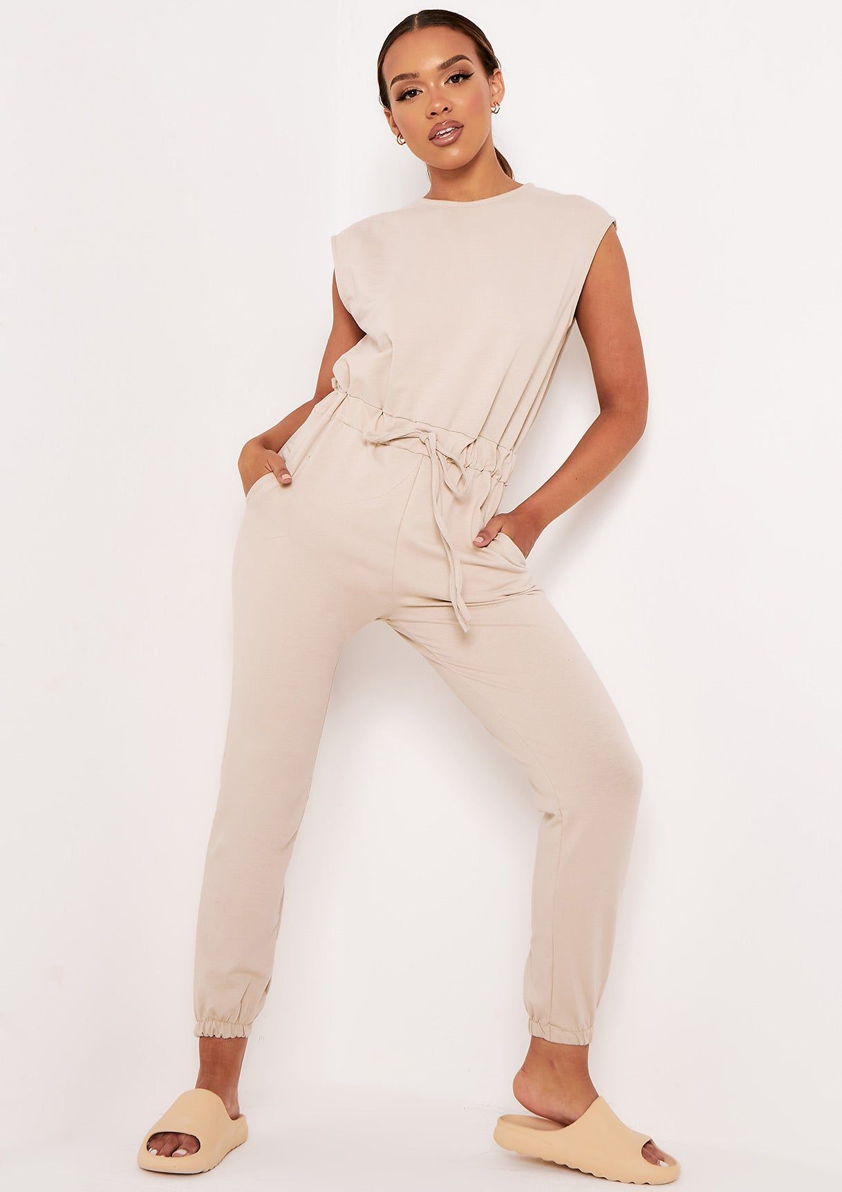Abbi Beige Sleeveless Cinched Waist Jumpsuit sold by Missy Empire