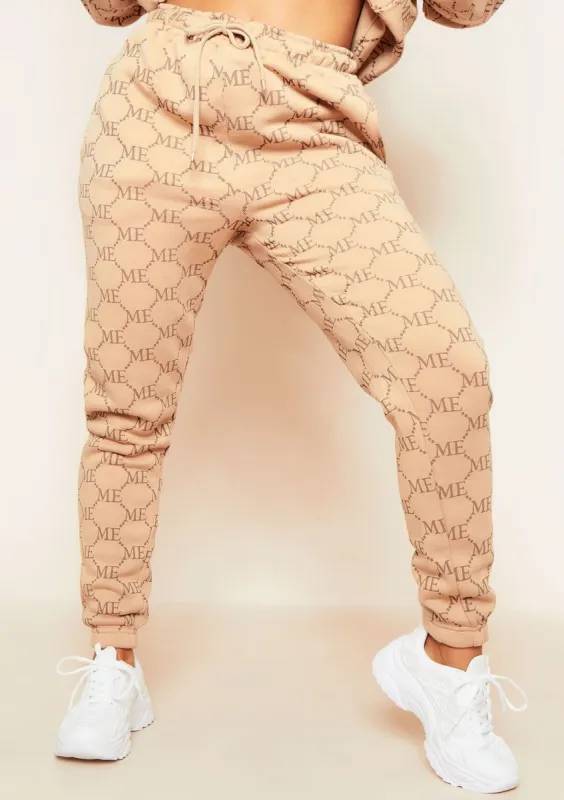 Kendal Beige Missy Empire Repeat Slogan Joggers sold by Missy Empire