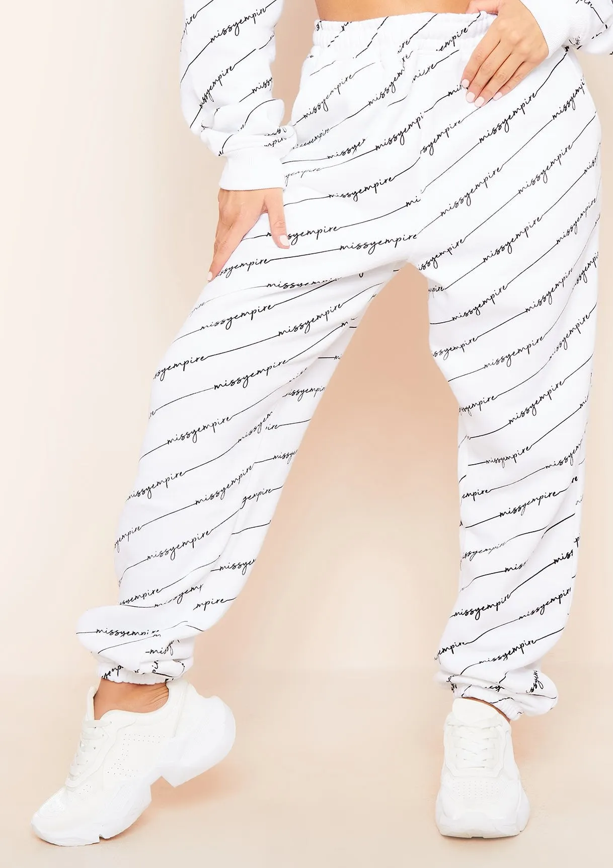 Eliora White Missy Empire Repetitive Slogan Joggers sold by Missy Empire