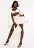 Clarina Beige Rib Mini Skirt sold by Missy Empire