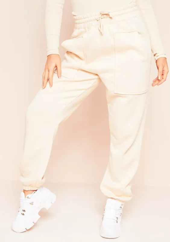 Romy Cream Pocket Front Oversized Joggers sold by Missy Empire