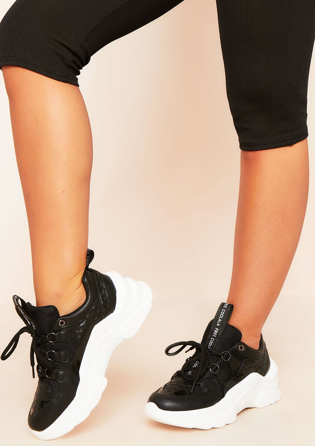 Bella Black Chunky Sole Slogan Trainers sold by Missy Empire