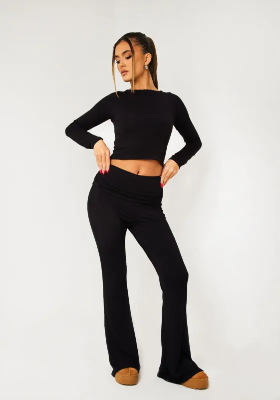 Alena Black Fold Over Flared Yoga Pants sold by Missy Empire