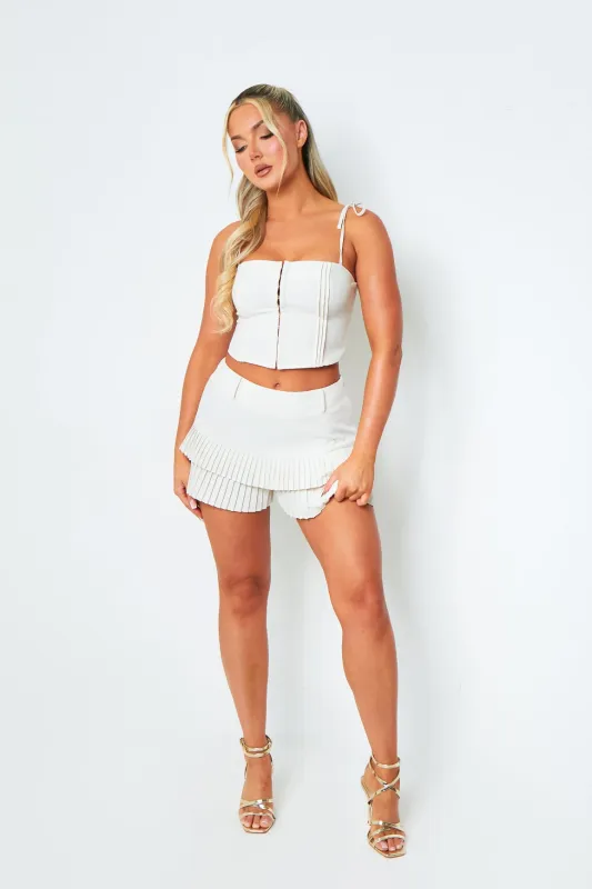 Olivia Cream Ruffle Mini Shorts sold by Missy Empire