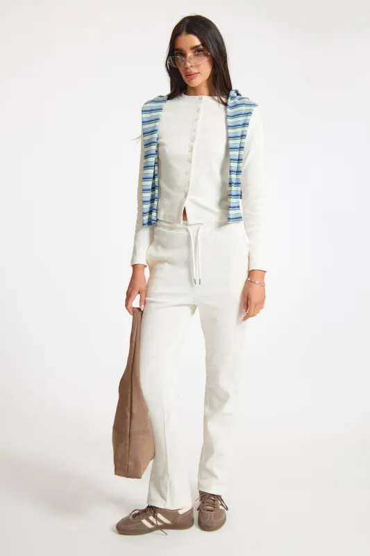 Cream Ribbed Slouch Fit Adjustable Waist Jogger made by Missy Empire