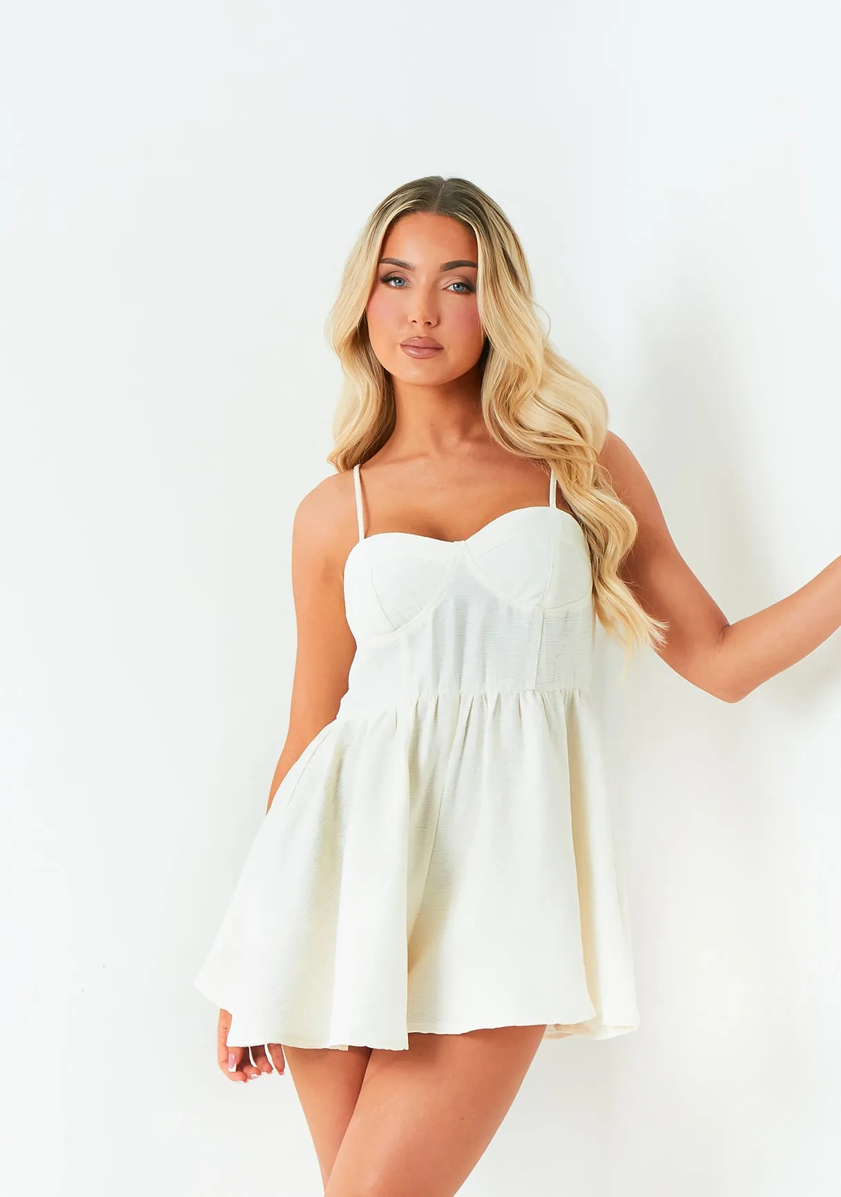 Paloma Cream Textured Strappy Playsuit sold by Missy Empire
