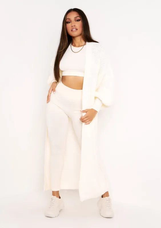 Nathalie Ivory Balloon Sleeve Knitted Cardigan sold by Missy Empire