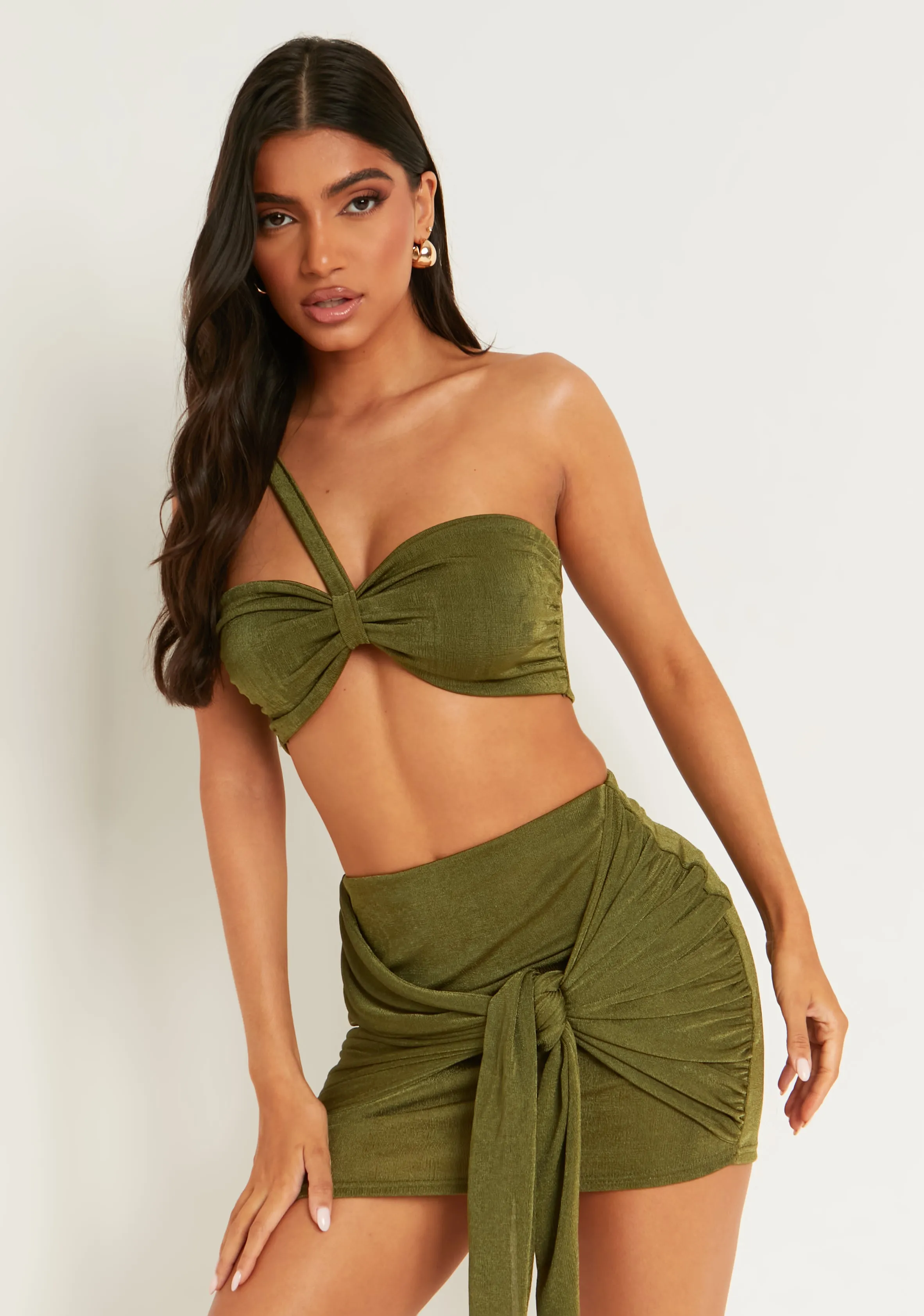 Sarai Olive Knot Detail Mini Skirt sold by Missy Empire