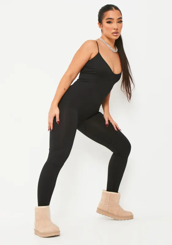 Kora Black Ribbed Seamless Strappy Jumpsuit sold by Missy Empire