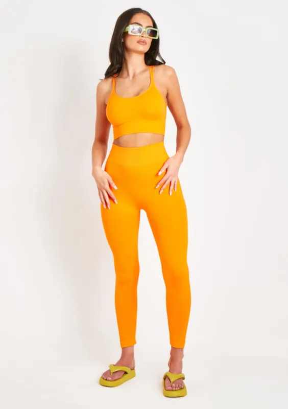 Cyndi Orange Seamless Ribbed High Waisted Leggings sold by Missy Empire