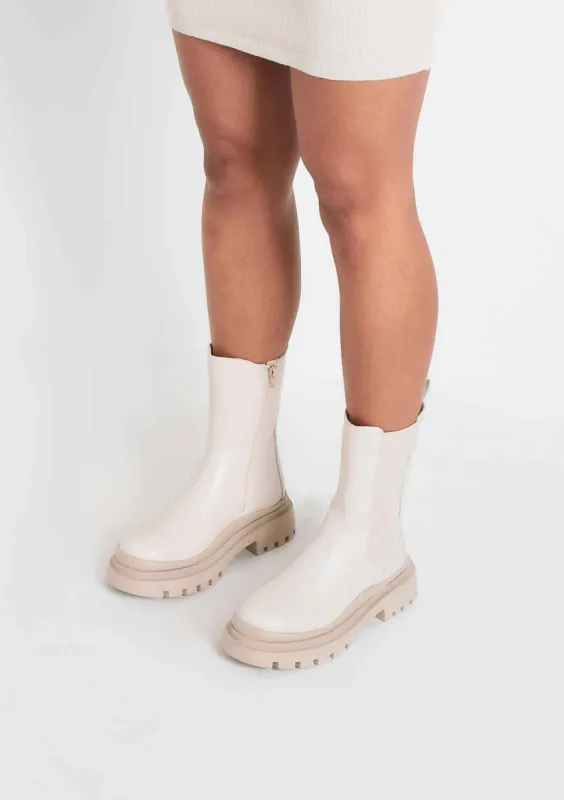 Heidi Beige Chunky Track Sole Ankle Boots sold by Missy Empire