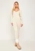 Eli Cream Plunge Ribbed Seamless Long Sleeve Jumpsuit sold by Missy Empire