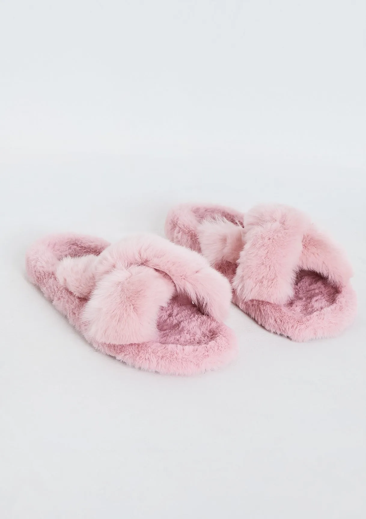 Jodie Pink Cross Over Slippers sold by Missy Empire