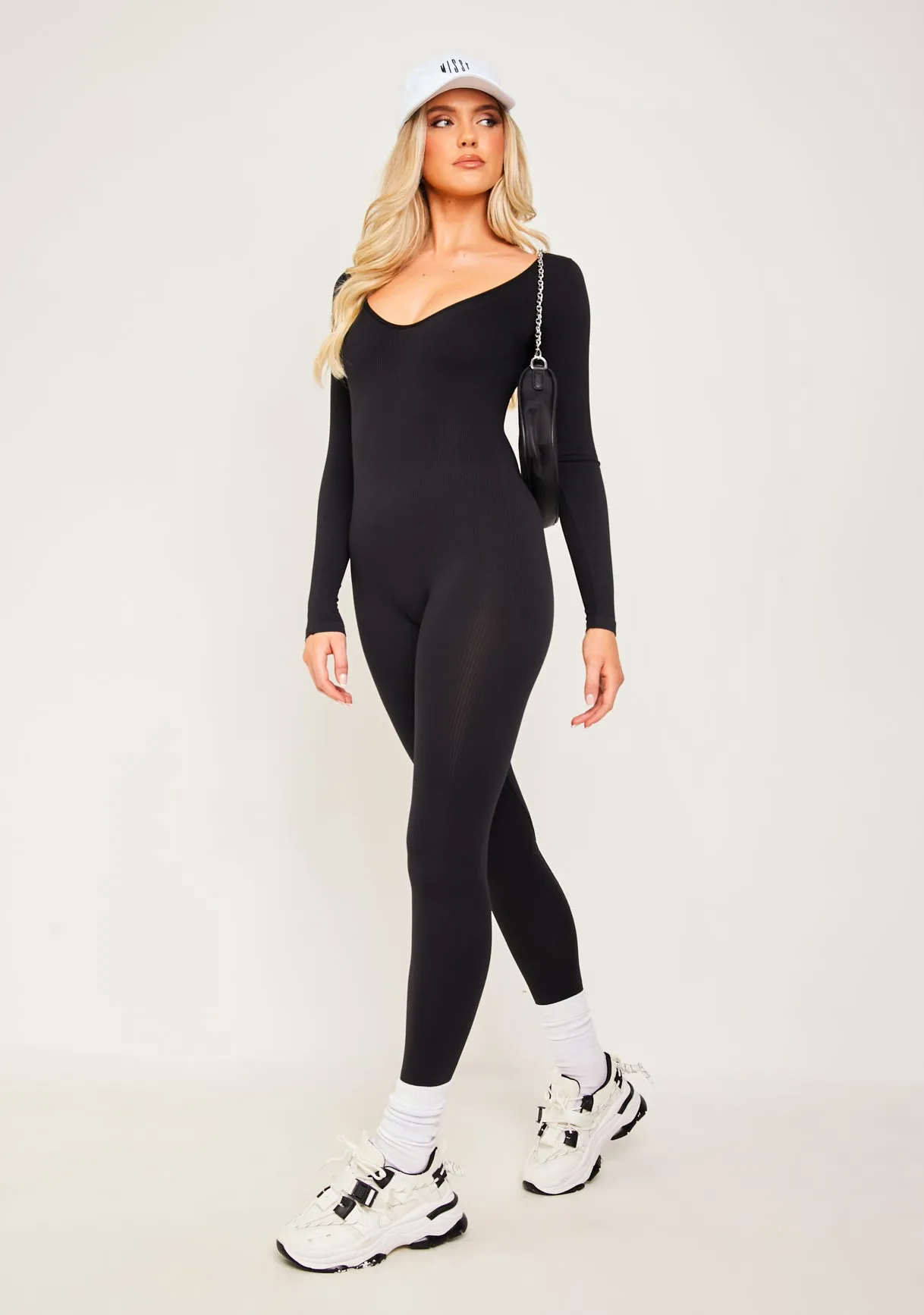 Eli Black Plunge Ribbed Seamless Long Sleeve Jumpsuit sold by Missy Empire