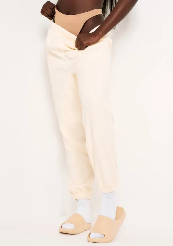 Melina Cream Fleece Joggers sold by Missy Empire
