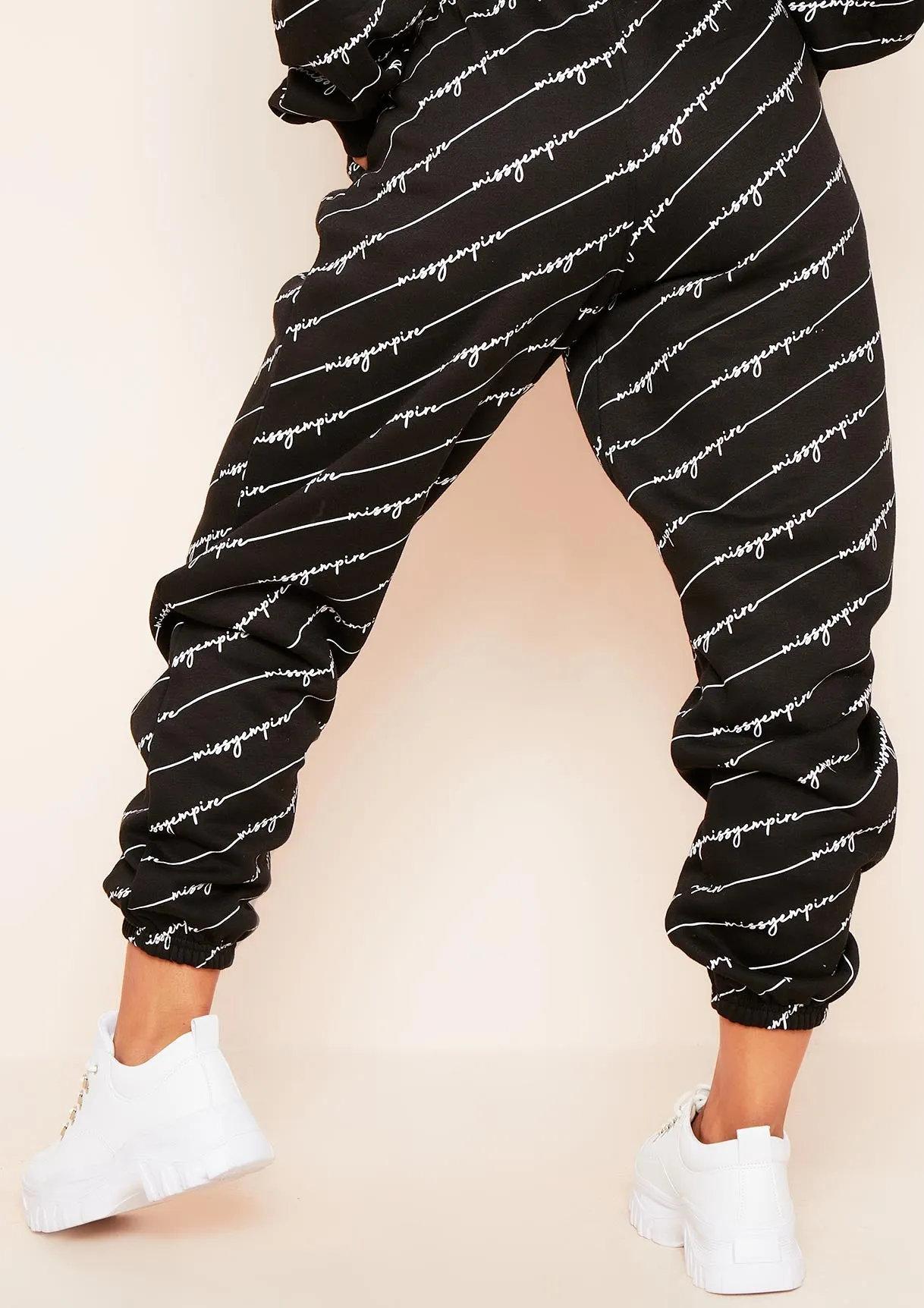 Eliora Black Missy Empire Repetitive Slogan Joggers sold by Missy Empire product image thumbnail 3