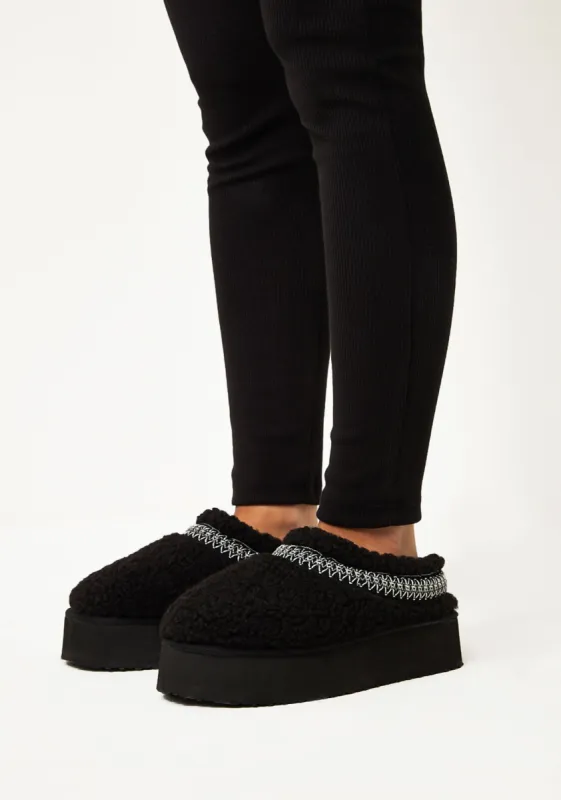 Tammy Black Platform Faux Shearling Slip On Boots sold by Missy Empire