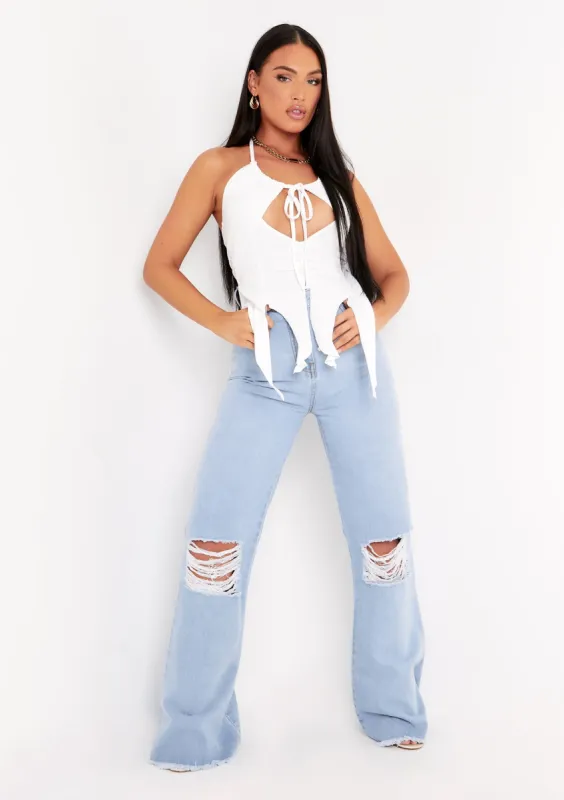 Justine Light Blue Wash Wide Leg Ripped Denim Jeans sold by Missy Empire