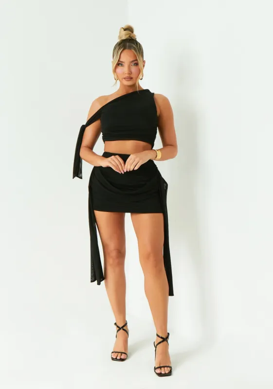 Elise Black Drape Detail Mesh Mini Skirt sold by Missy Empire