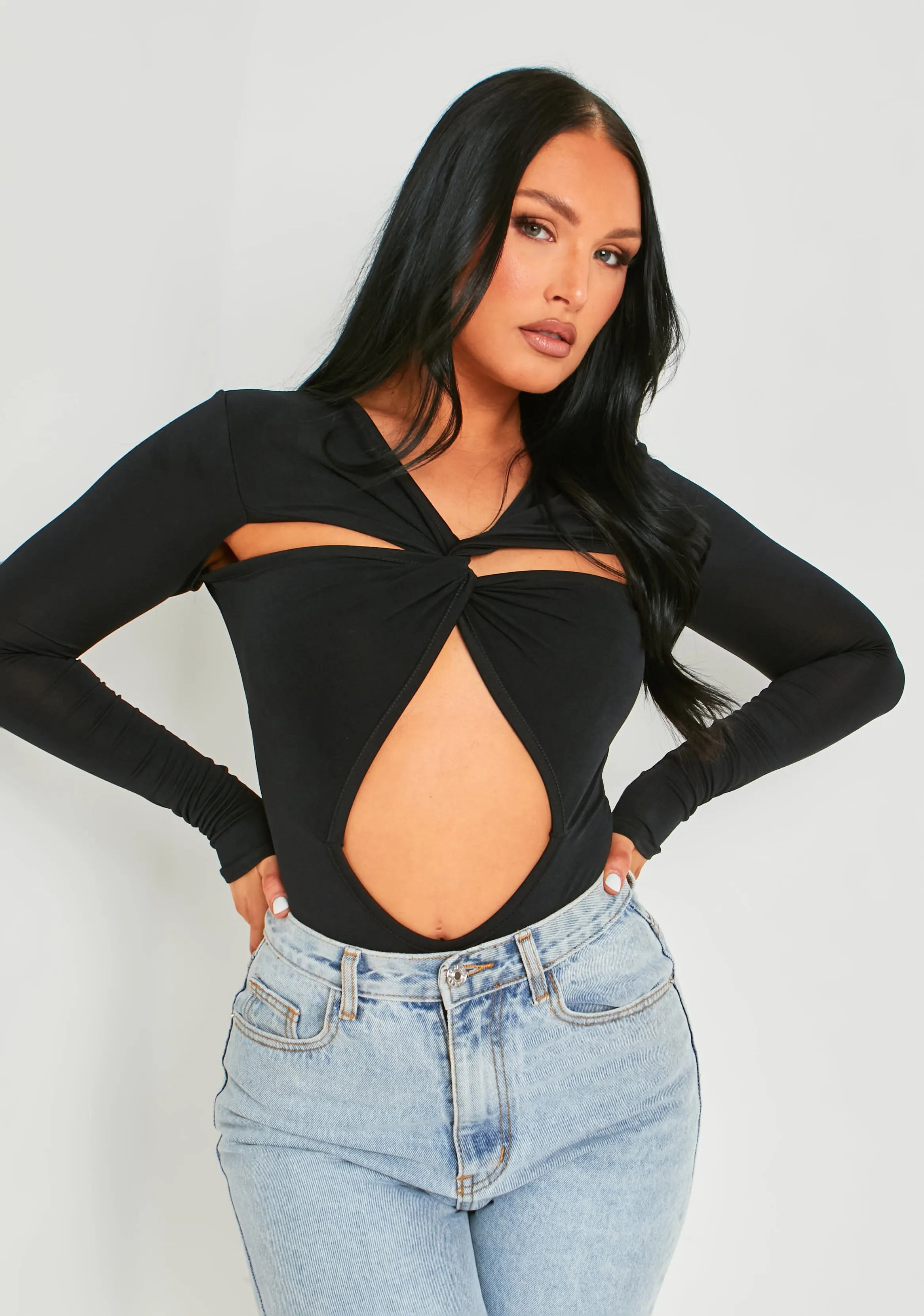 Bronte Black Cut Out Asymmetric Long Sleeve Bodysuit sold by Missy Empire