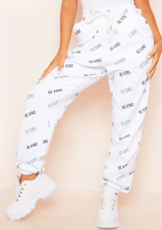 Candice White BE KIND Repetitive Text Oversized Joggers sold by Missy Empire