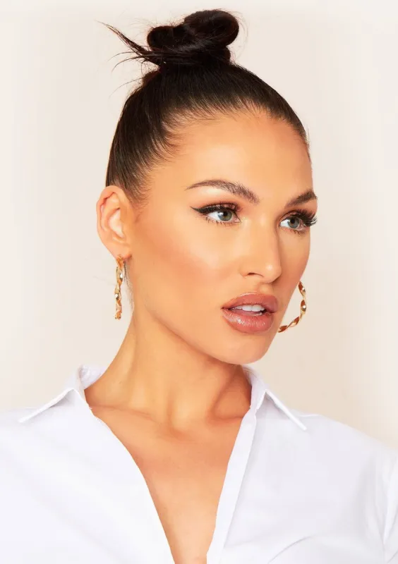 Skyla Gold Twisted Hoop Earrings sold by Missy Empire