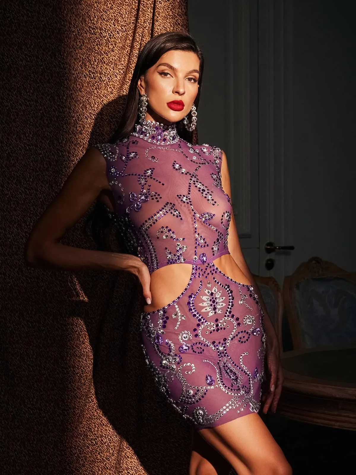 Phebe Sleeveless Rhinestone Cutout Mini Dress sold by Mew Mews