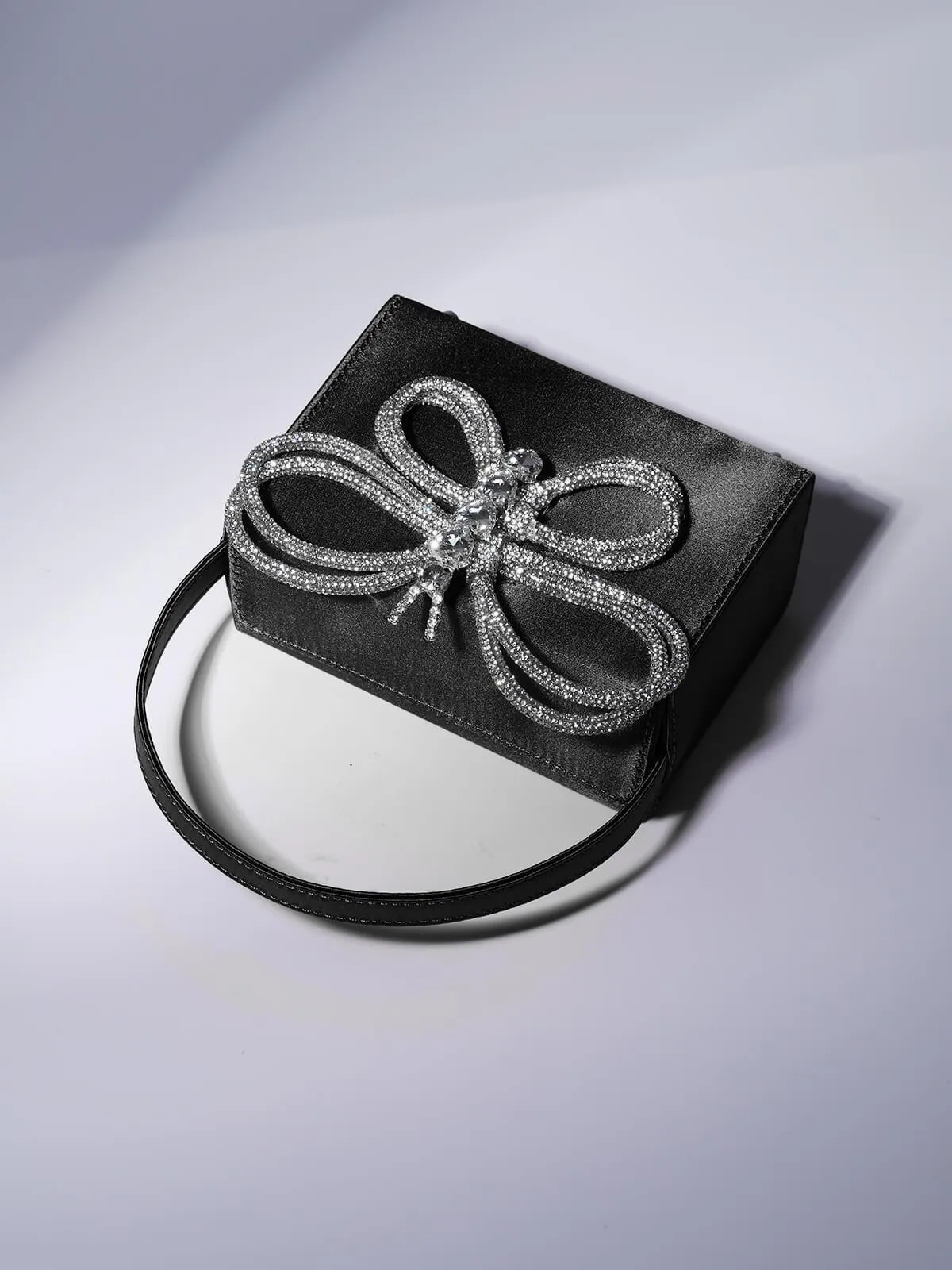 Fia Crystal Butterfly Clutch In Black sold by Mew Mews