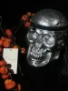 Alaric Silver Skull Clutch sold by Mew Mews