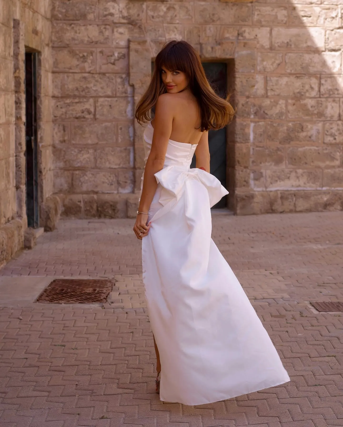 Siobhan Strapless Bow Ruched Mini Dress In White sold by Mew Mews product image thumbnail 2