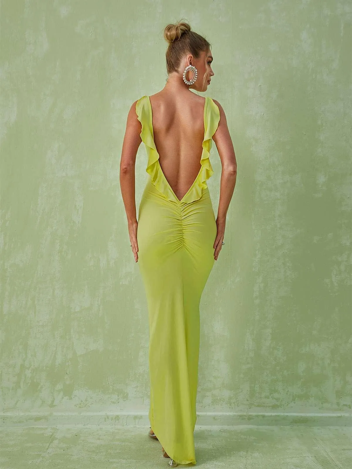 Marzia Backless Maxi Dress In Green sold by Mew Mews