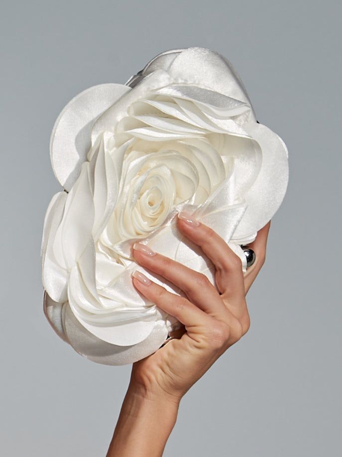 Ifuru White Flower Satin Clutch sold by Mew Mews