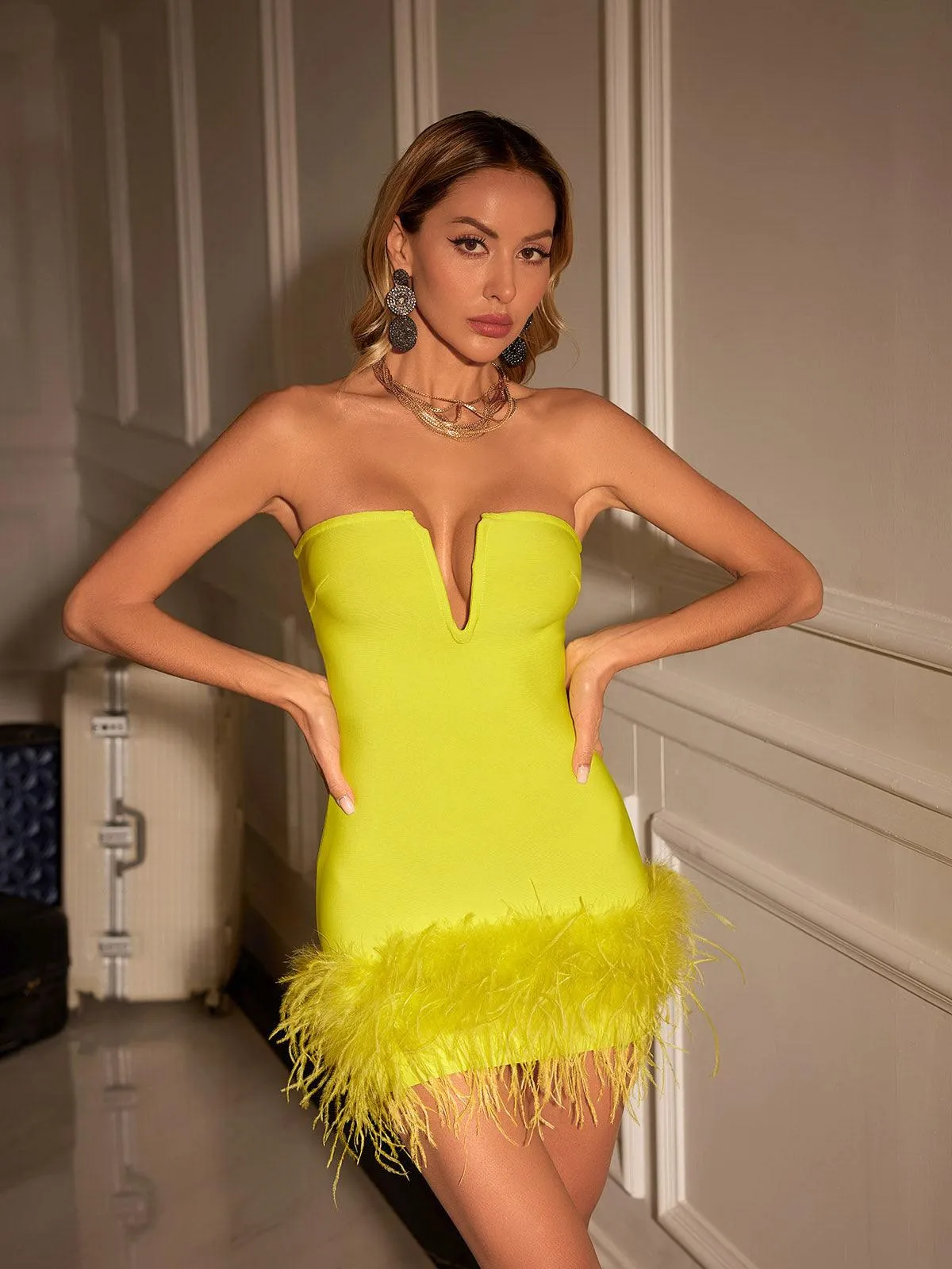 Veer Strapless Feather Bandage Dress In Yellow sold by Mew Mews