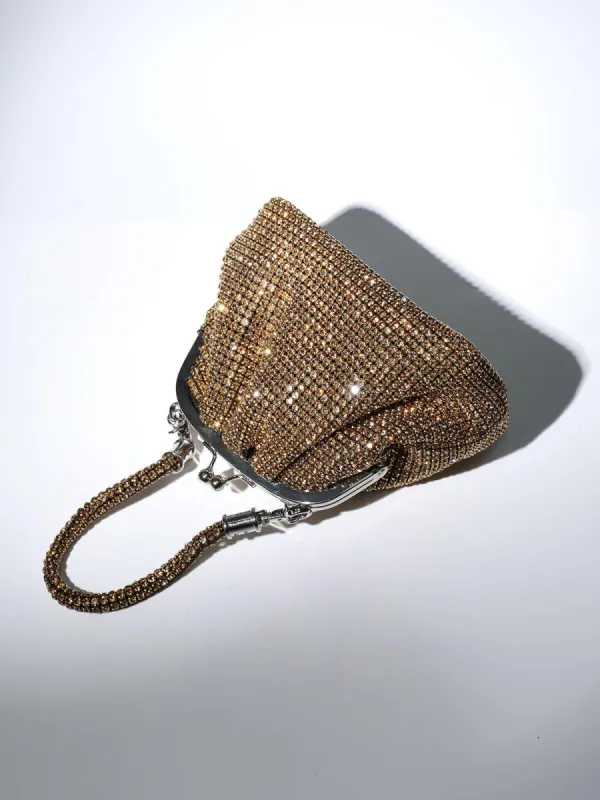 Mairead Shell Clutch In Gold sold by Mew Mews