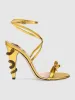 Juliette Metallic Snake Heel Sandals In Gold sold by Mew Mews
