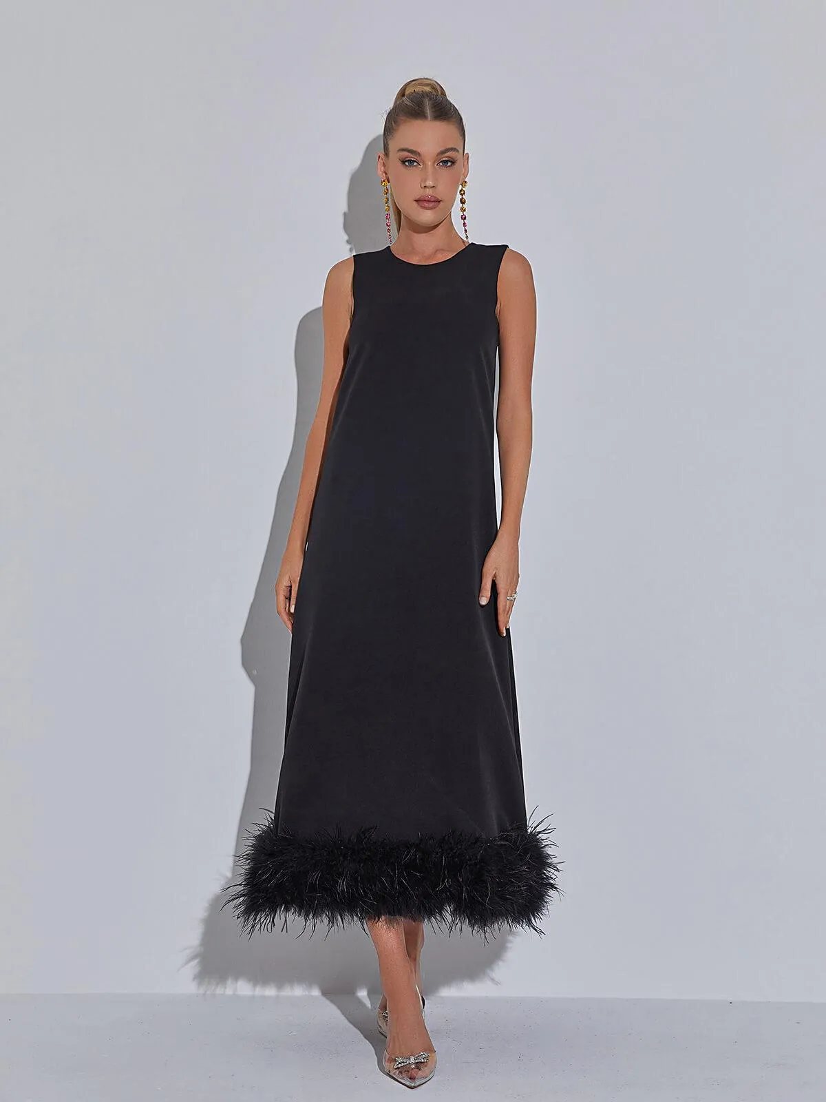 Nisha Feather Midi Dress In Black sold by Mew Mews