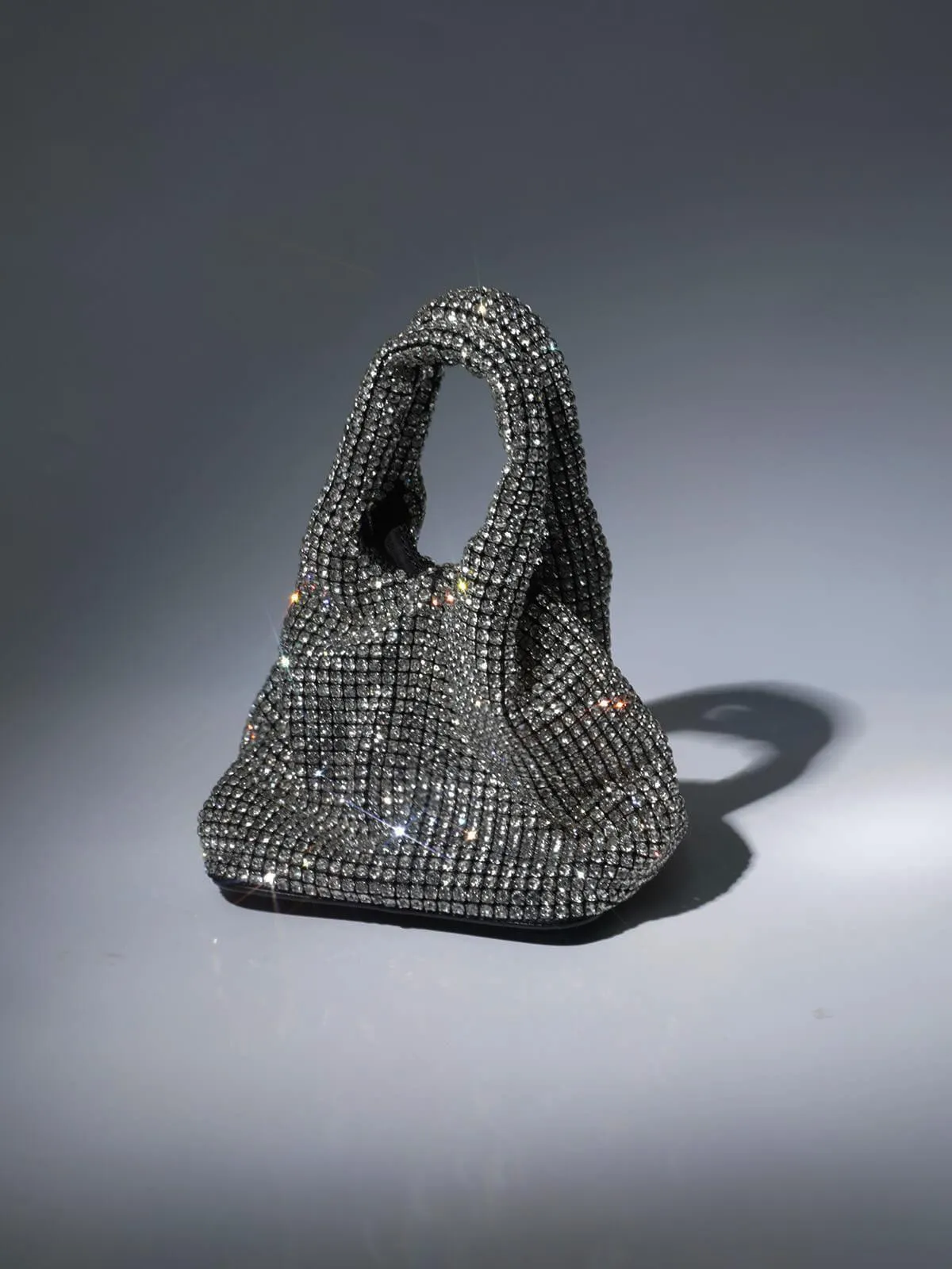 Bellatrix Crystal Bucket Bag In Silver sold by Mew Mews