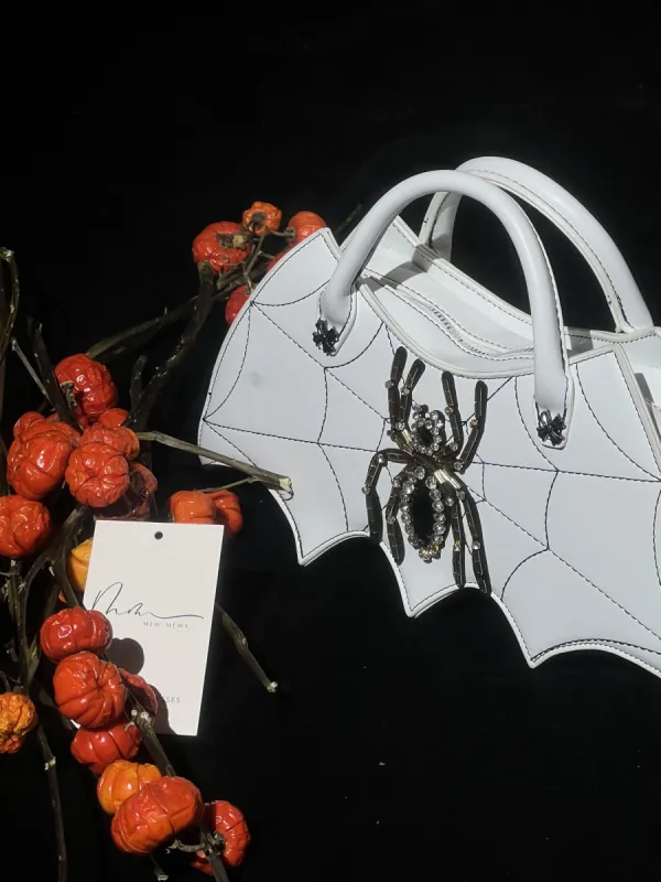 Octavia Cobweb Crystal Clutch sold by Mew Mews