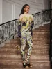 Choncey Rhinestone Printed Jumpsuit sold by Mew Mews