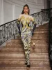 Choncey Rhinestone Printed Jumpsuit sold by Mew Mews