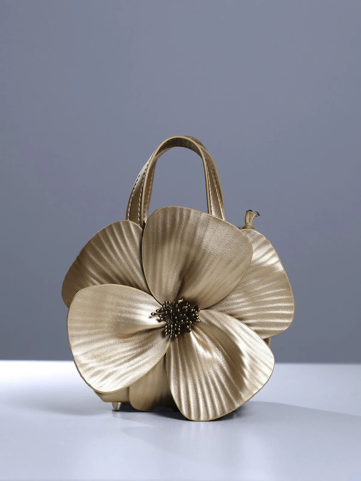 Acsah Leather Flower Bag In Gold sold by Mew Mews