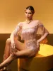 Axiom Long Sleeve Fringe Bodysuit In Nude sold by Mew Mews