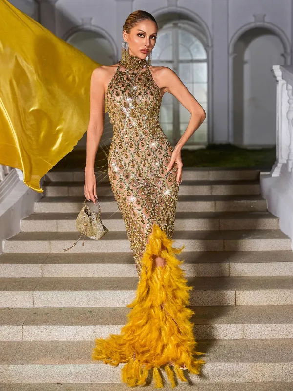 Liora Crystal Feather Mesh Maxi Dress In Gold sold by Mew Mews