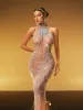 Hyrthos High Neck Crystal Chain Fringe Maxi Dress sold by Mew Mews