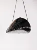 Maika Seashell Convertible Clutch In Silver sold by Mew Mews