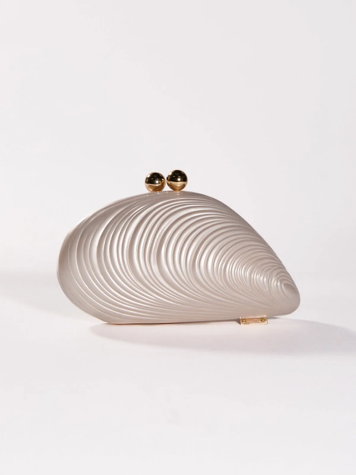 Mahin Seashell Convertible Clutch sold by Mew Mews