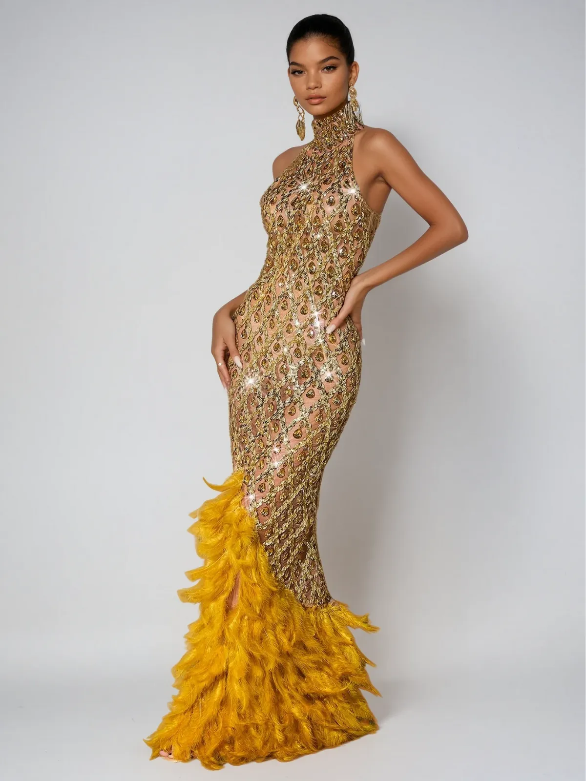 Liora Crystal Feather Mesh Maxi Dress In Gold sold by Mew Mews