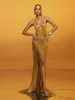 Elvrik Halterneck Fringe Cutout Split Maxi Dress In Gold sold by Mew Mews